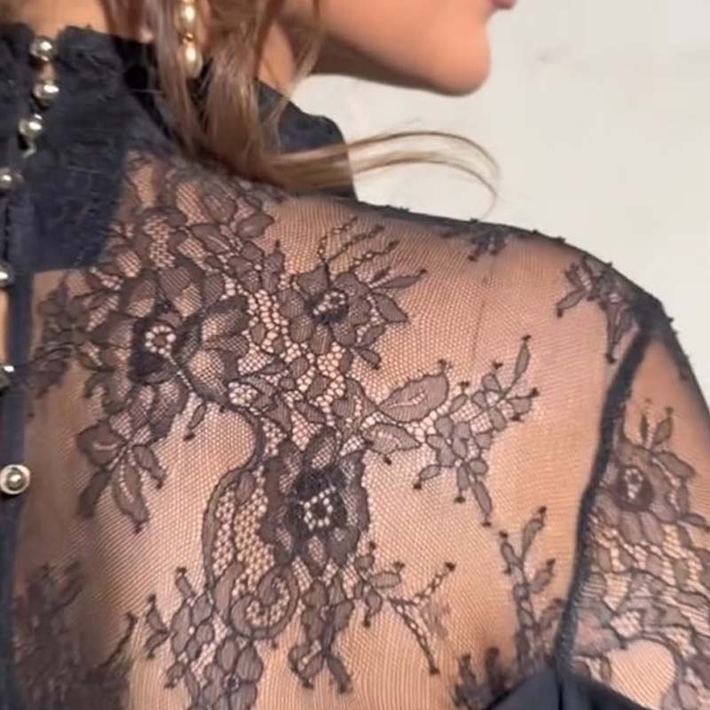 Elegant midi dress for women with a stand-up collar and lace detailing on the back